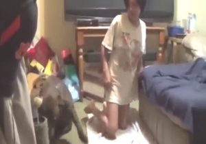 Asian MILF shows her wet vag and lets dog lick