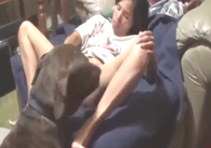 Asian MILF shows her wet vag and lets dog lick